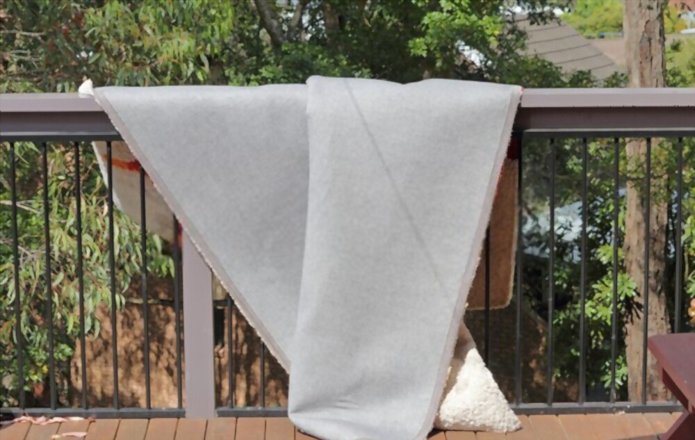 Hang Your Rugs On A Clothesline Or Railing